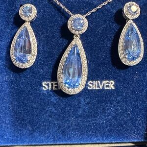 Blue tube pad in Sterling, silver pear, shaped necklace, and matching earrings